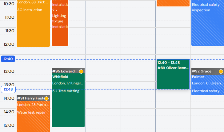 A visit block being dragged in the calendar, with its new times on the block and dashed guide lines pointing to time bubbles on the time axis