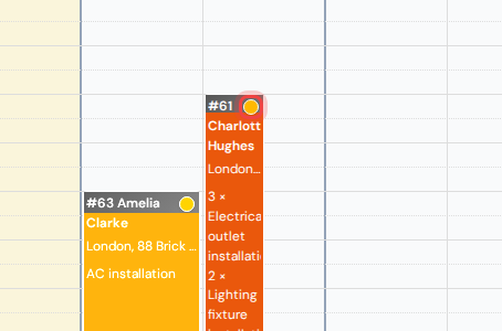 A visit block in the calendar with the client confirmation dot highlighted in its corner