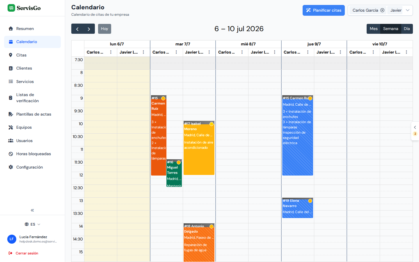 El calendario en vista semanal con las columnas de Carlos García y Javier López, llenas de visitas a lo largo de la semana
