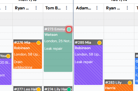 A plumbing visit block with the client confirmation dot highlighted in the calendar