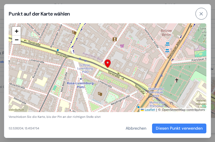Das Fenster Punkt auf der Karte wählen mit einer Straßenkarte, dem fest in der Mitte sitzenden Pin und der Schaltfläche Diesen Punkt verwenden