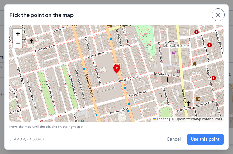 The Pick the point on the map window with a street map, the pin fixed in the middle and the Use this point button